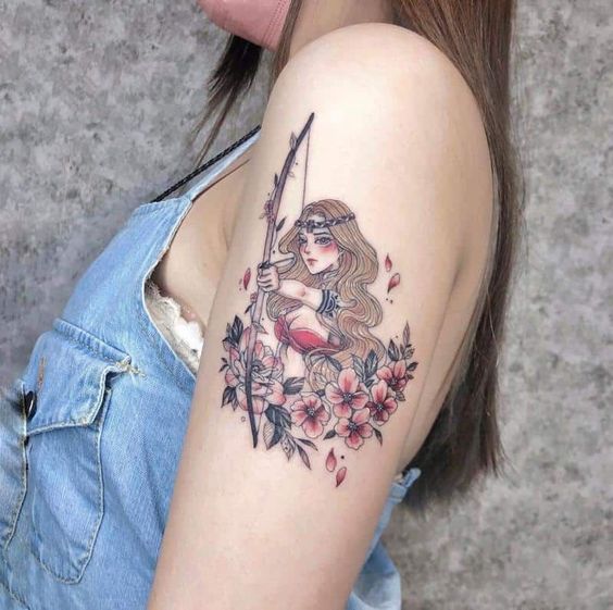 Tattoo of the zodiac sign Sagittarius on the shoulder for women