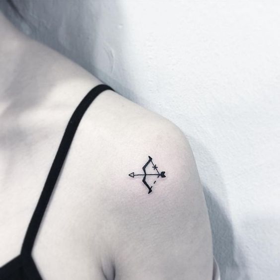 Tattoo of the zodiac sign Sagittarius on the shoulder for women