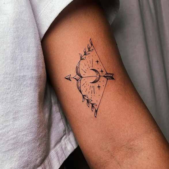 Tattoo of the zodiac sign Sagittarius on the shoulder for women