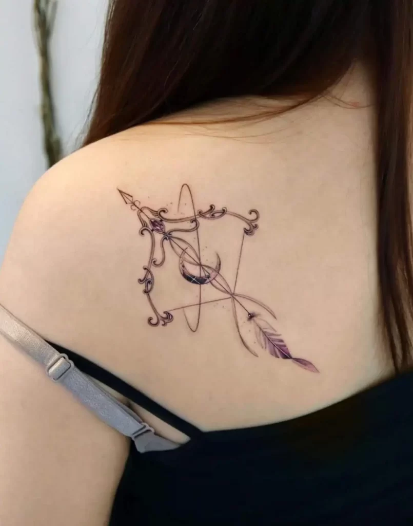 Sagittarius zodiac sign tattoo on the shoulder blade for women