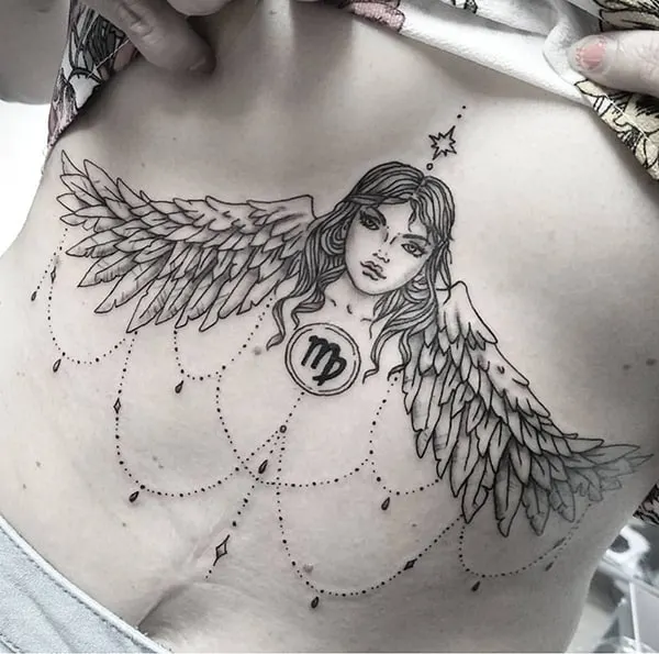 Tattoo of the zodiac sign Virgo on the stomach for women