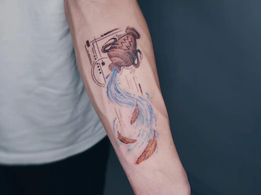 Aquarius zodiac sign tattoo on forearm for men