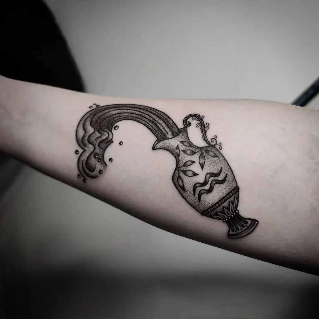 Aquarius zodiac sign tattoo on forearm