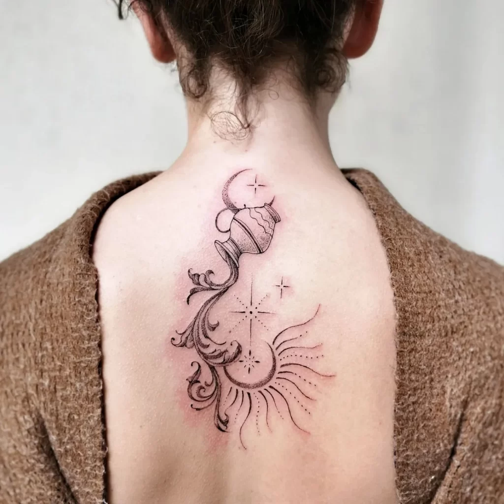 Aquarius zodiac sign tattoo on the back for women