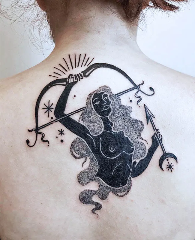 Sagittarius zodiac sign tattoo on the back for women