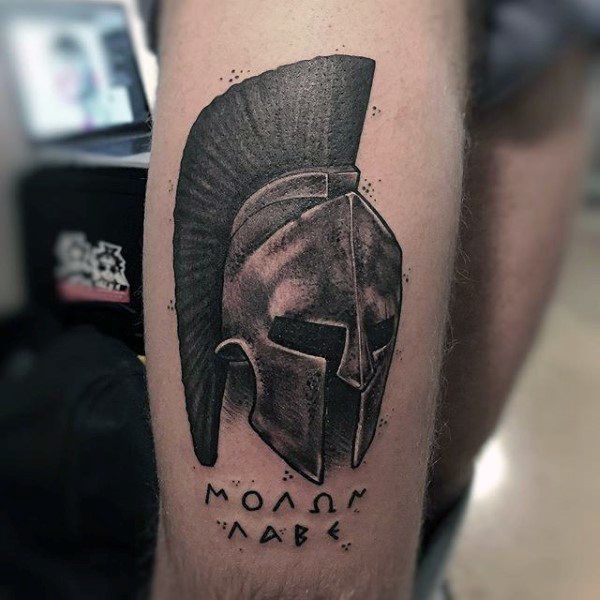 Spartan tattoo on the hip for men