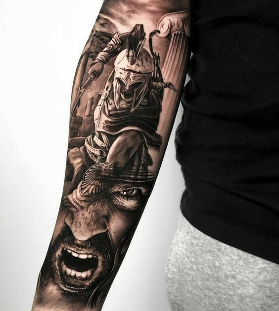 Spartan tattoo on the arm for men