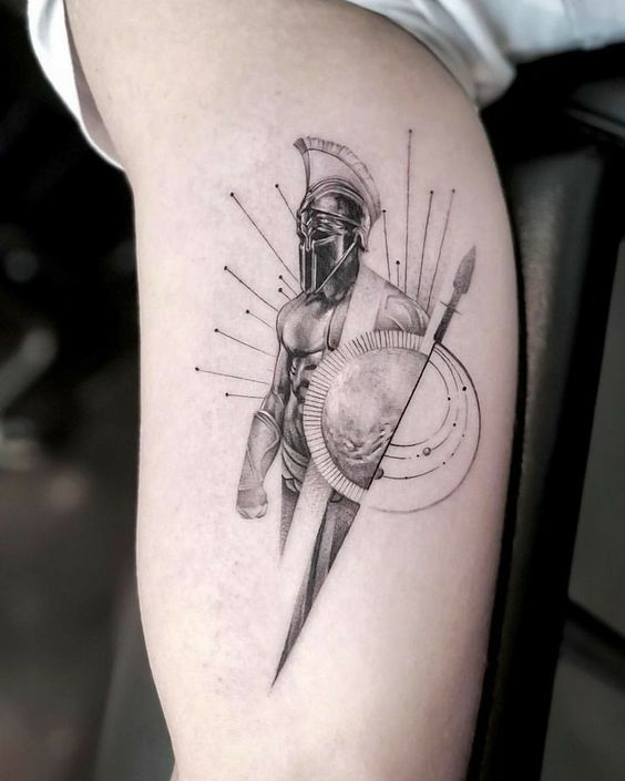 Spartan tattoo on the biceps for men