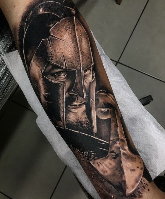 Spartan tattoo on forearm for men