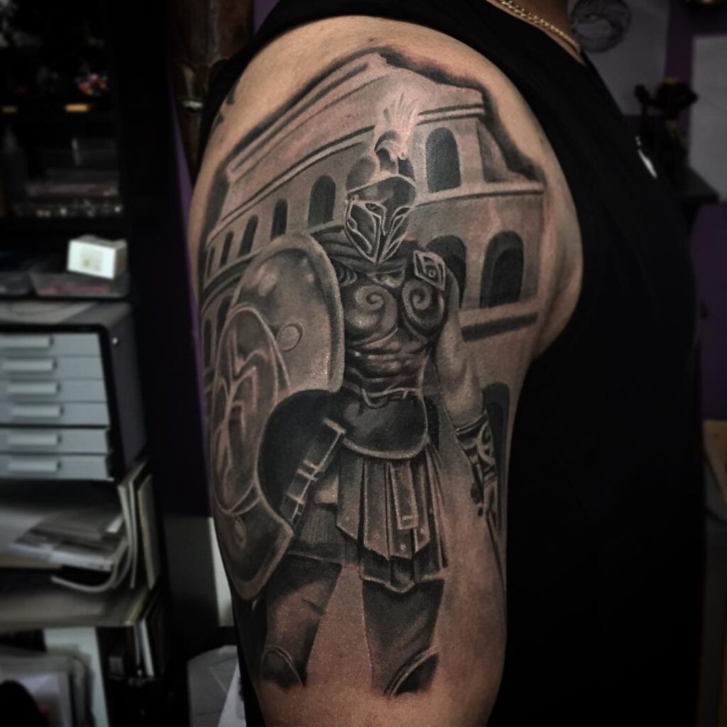 Spartan tattoo on the shoulder for men