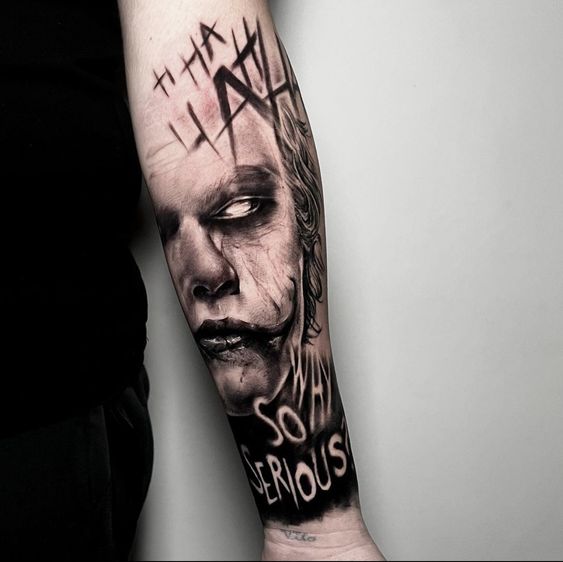 Joker tattoo on the arm for men