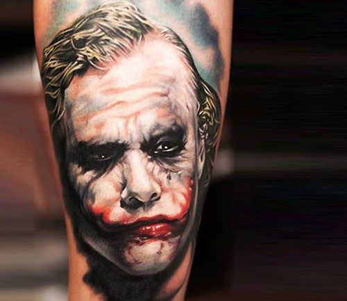 Joker tattoo on the forearm for men