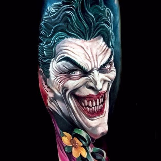 Joker tattoo on the arm