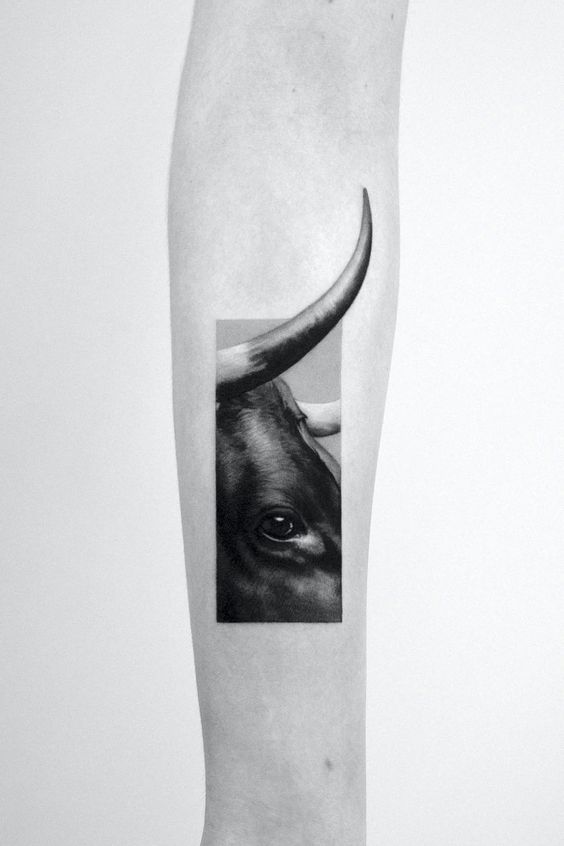 Bull tattoo on forearm for women