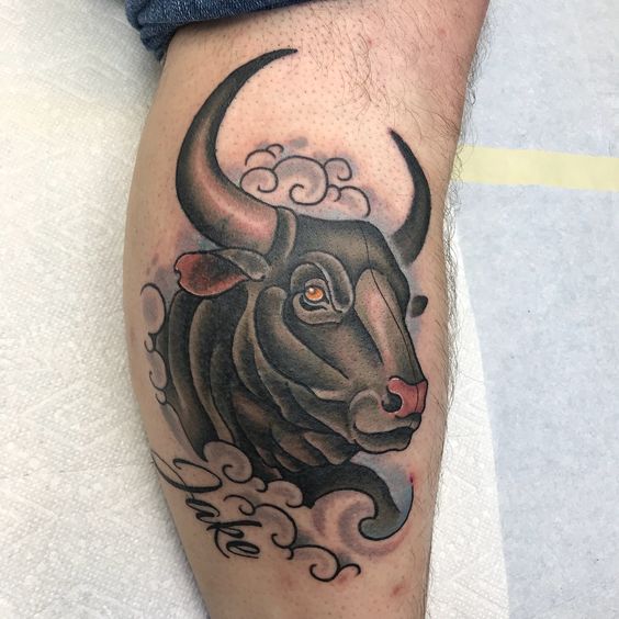 Tattoo of a bull on the leg for men