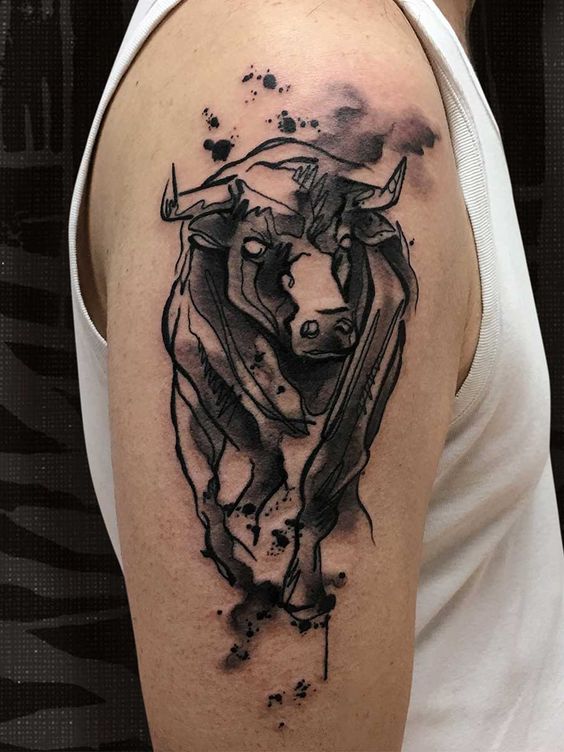 Tattoo of a bull on the shoulder for men