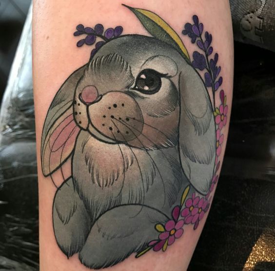 Tattoo of a hare (rabbit) on the shin for women