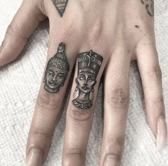 Nefertiti tattoo on the finger for women