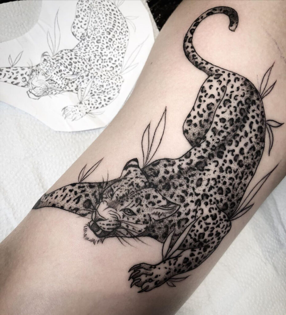 Cheetah tattoo on the shoulder for women