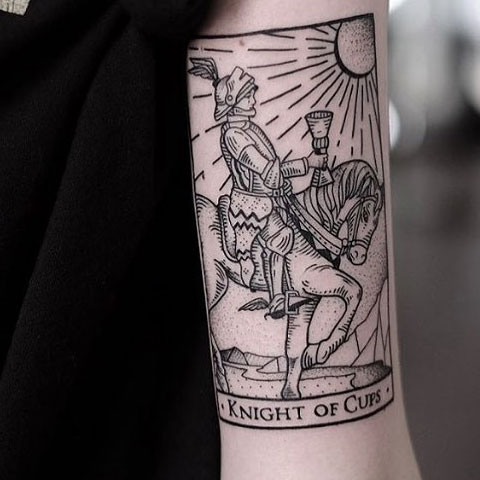 Tattoo of a knight on the shoulder for men