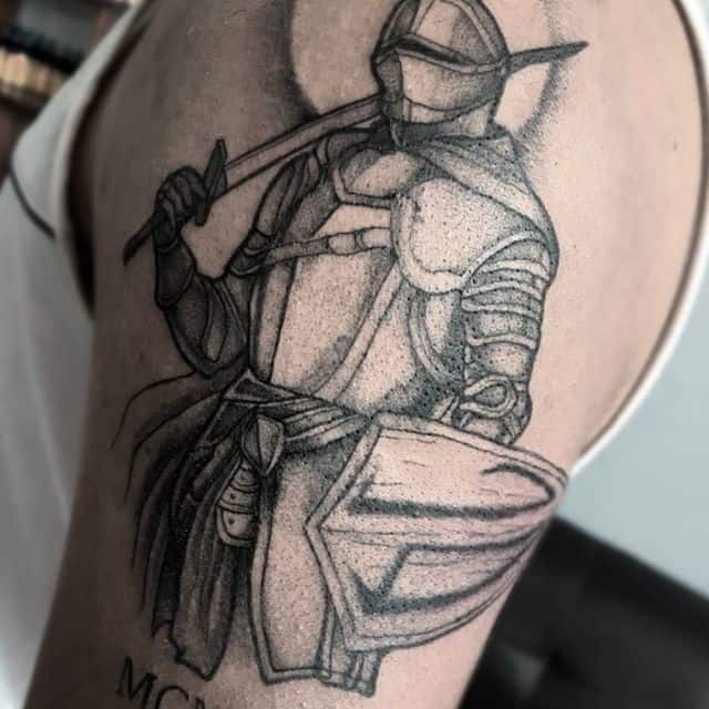 Tattoo of a knight on the shoulder for men