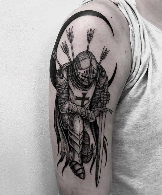 Tattoo of a knight on the shoulder for men