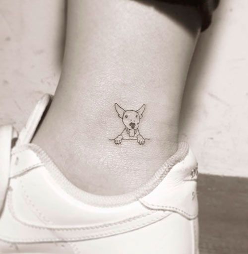 Ankle bull terrier tattoo for women