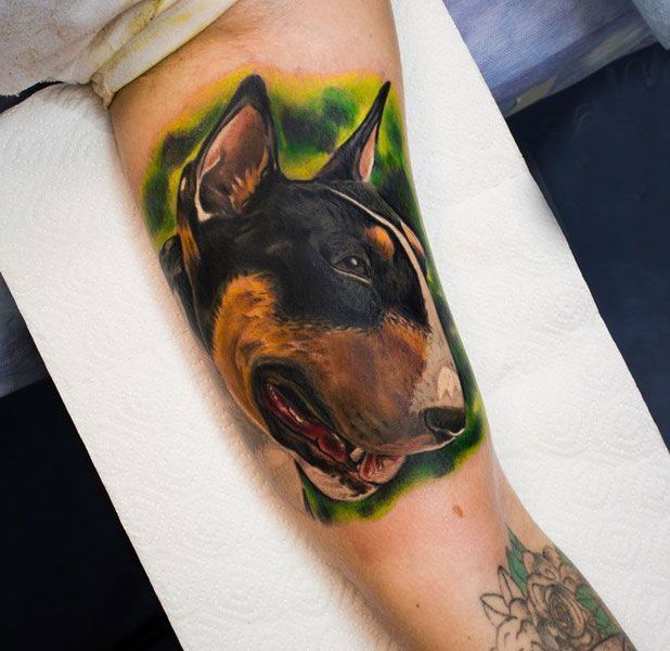 Bull Terrier tattoo on the biceps for men