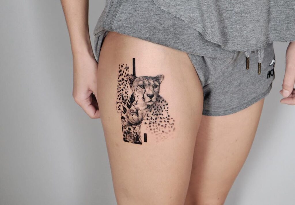 Cheetah tattoo on the hip for women