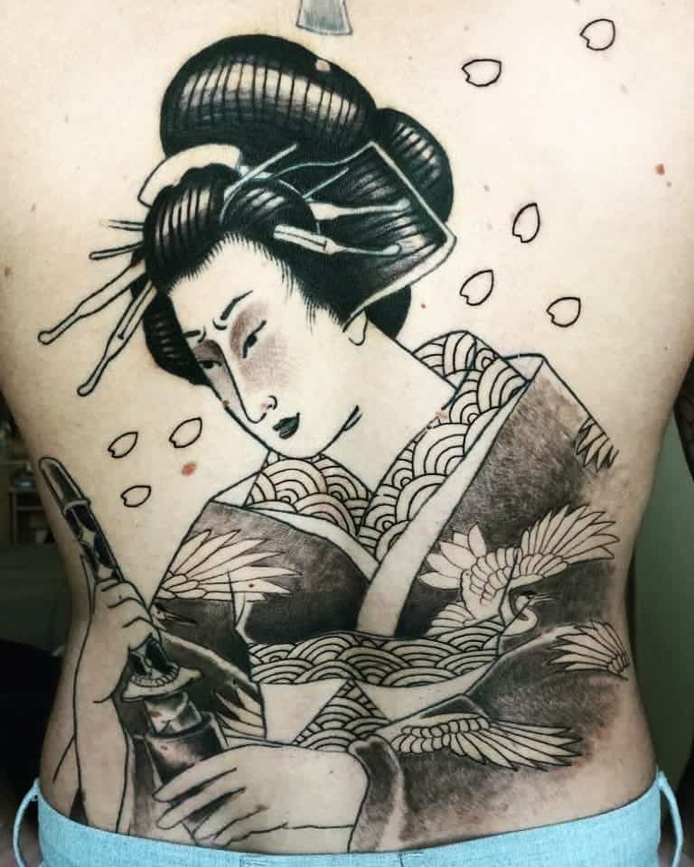 Geisha tattoo on the back for men