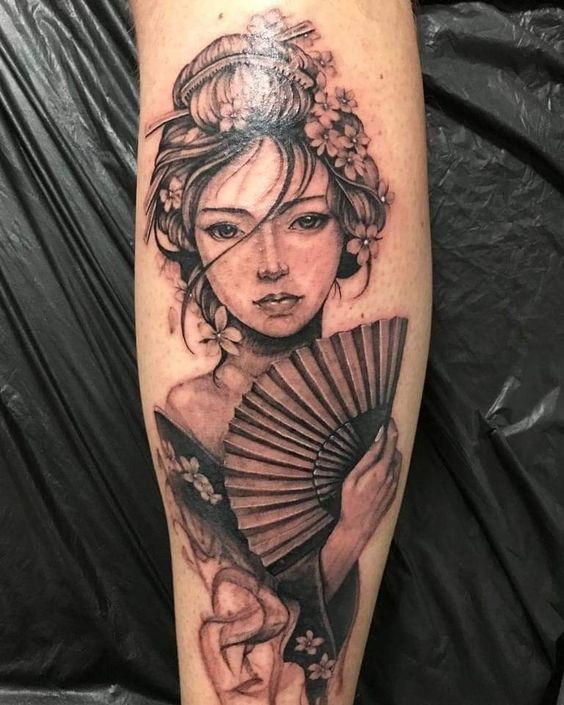 Geisha tattoo on forearm