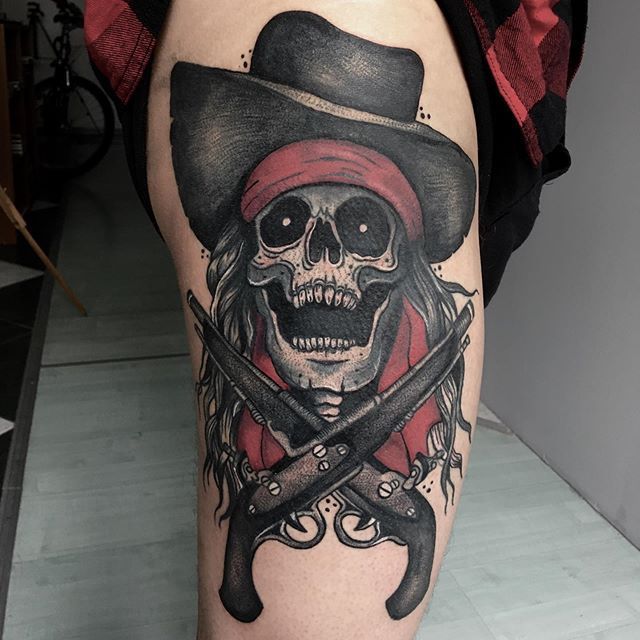 Pirate tattoo on thigh for women