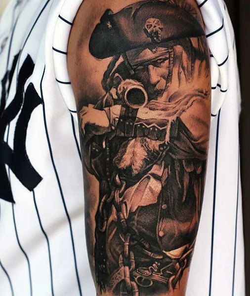 Tattoo of a pirate on the shoulder for men