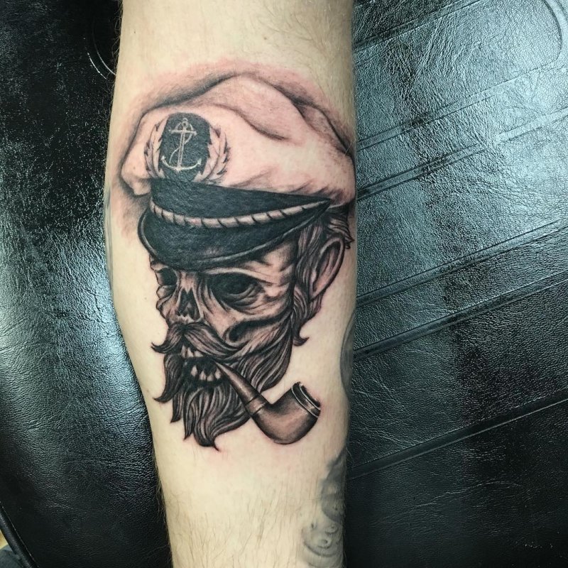 Tattoo of a pirate on the calf for men