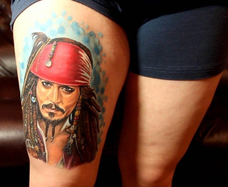 Pirate tattoo on thigh for women