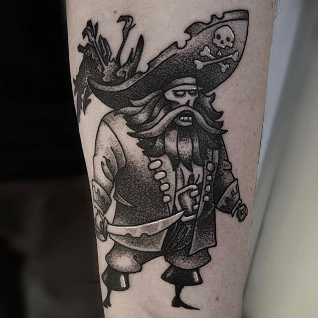 Pirate tattoo on the forearm