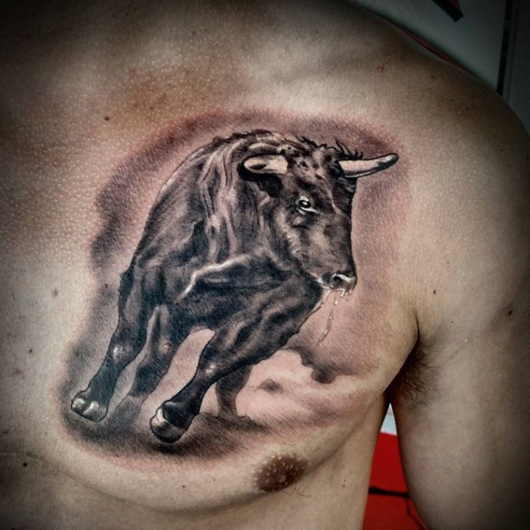 Bull tattoo on the chest for men