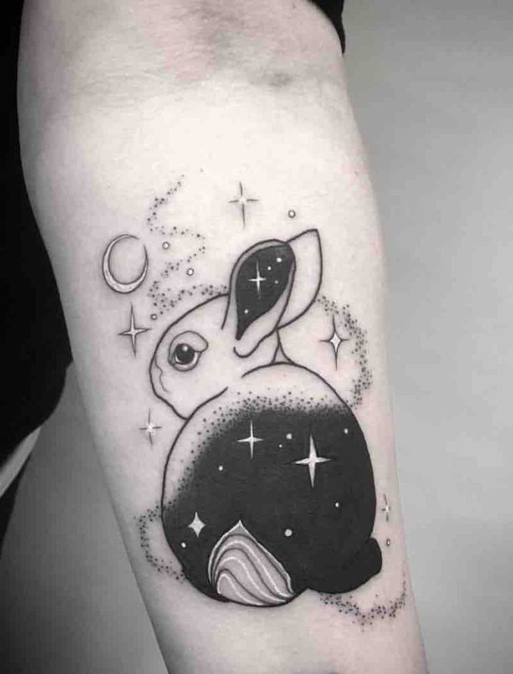 Tattoo of a hare (rabbit) on the forearm for men