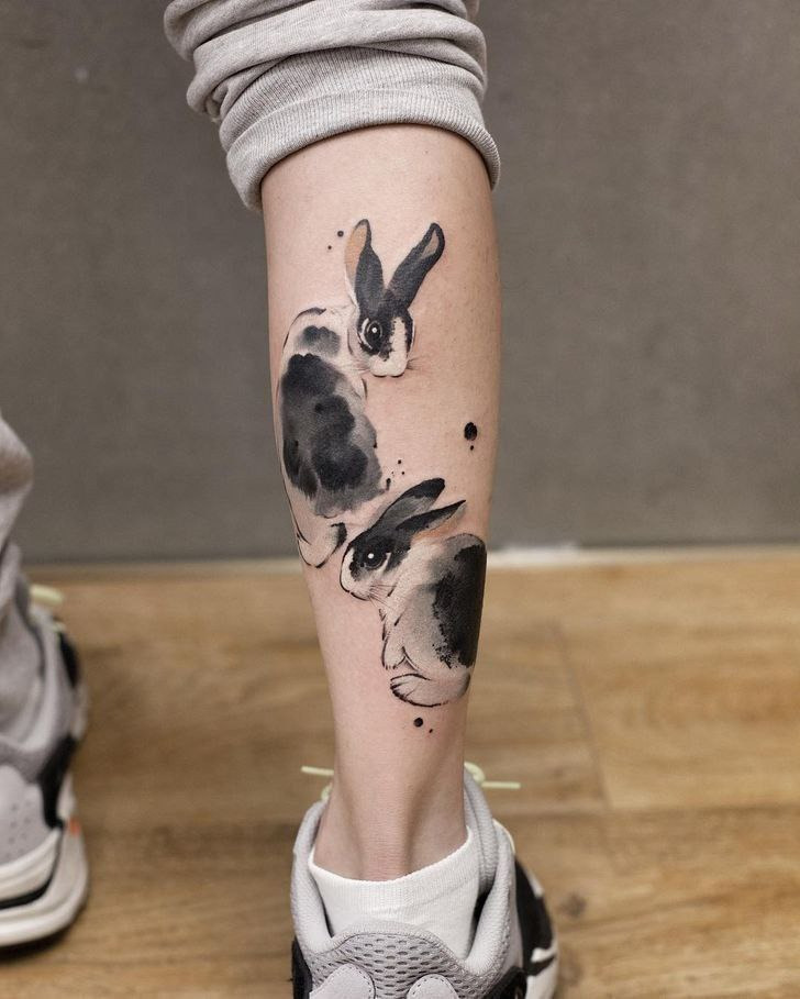 Tattoo of a hare (rabbit) on a calf for men