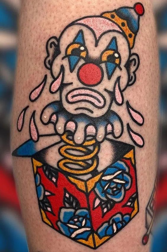 Clown tattoo on the leg