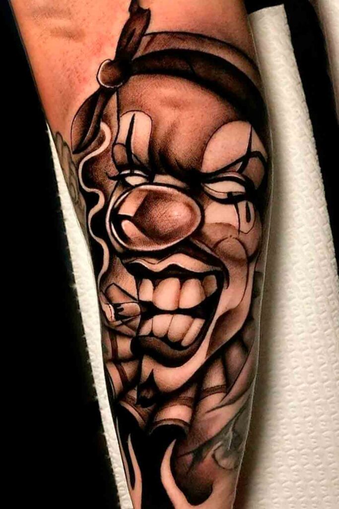 Tattoo of a clown on the forearm