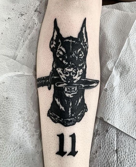 Doberman tattoo on the calf for men