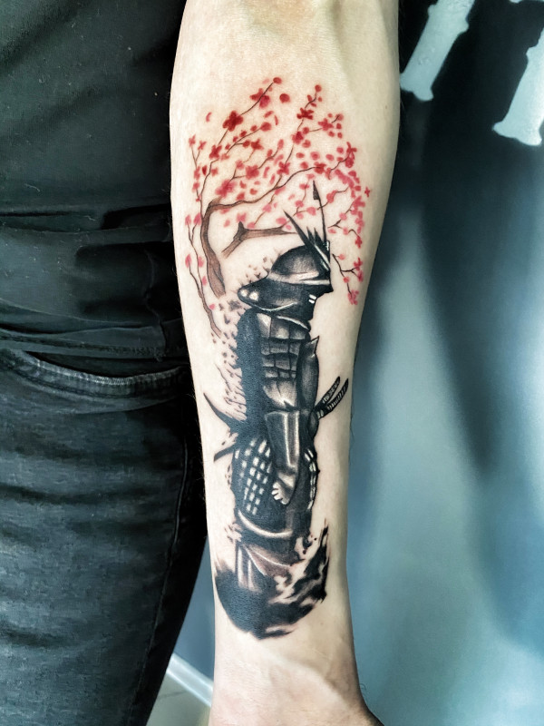 Samurai tattoo on forearm for women