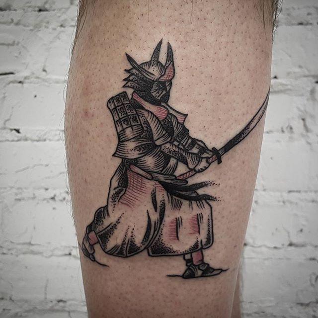 Samurai tattoo on the leg for men