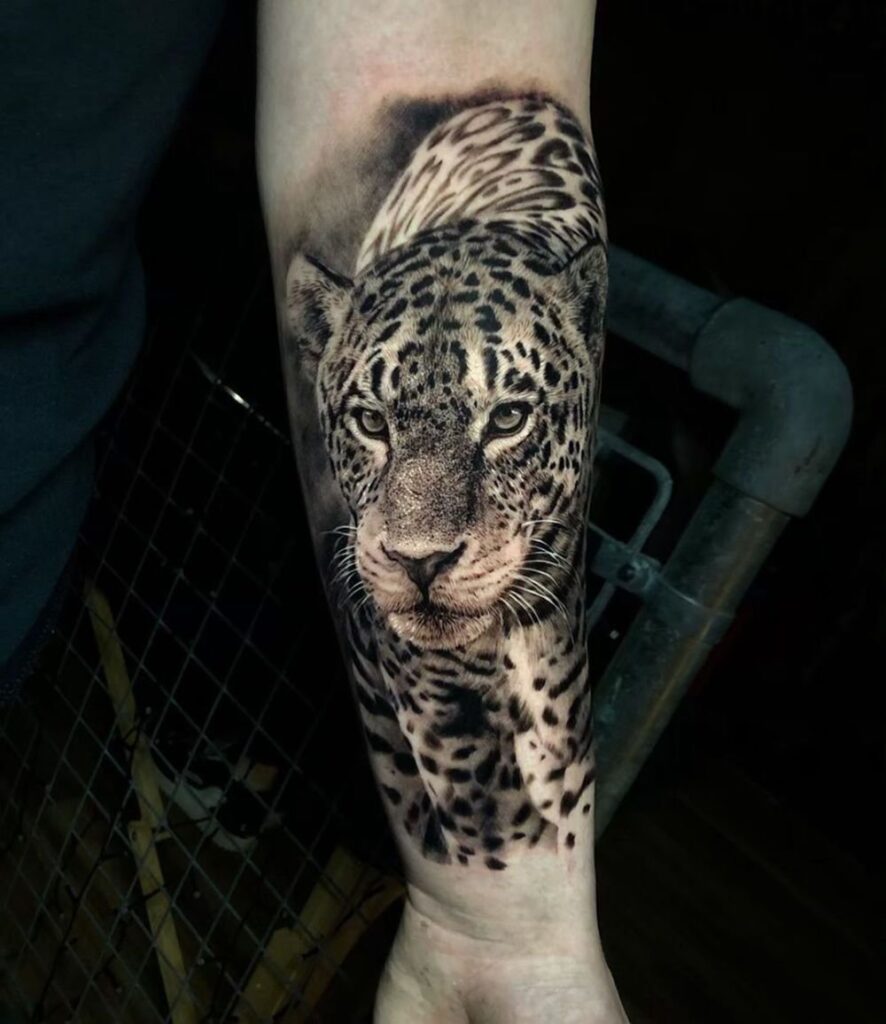 Leopard tattoo on the forearm for men