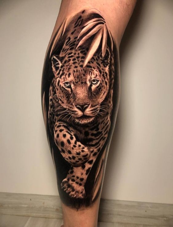 Leopard tattoo on the calf for men