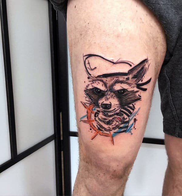 Tattoo of a raccoon on the hip for men