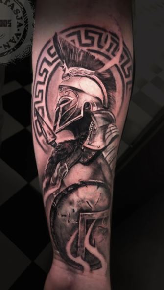 Spartan tattoo on the arm for men