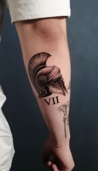 Spartan tattoo on forearm for men