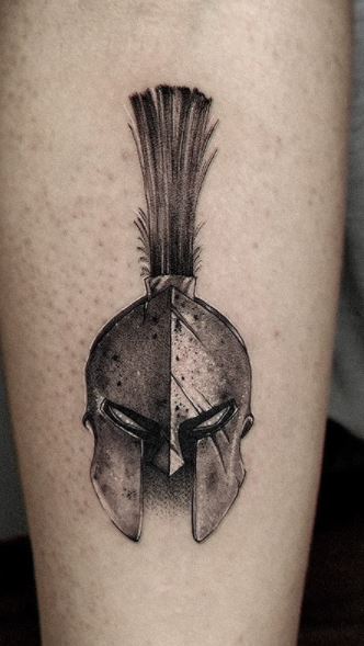 Tattoo of a Spartan on the leg for men